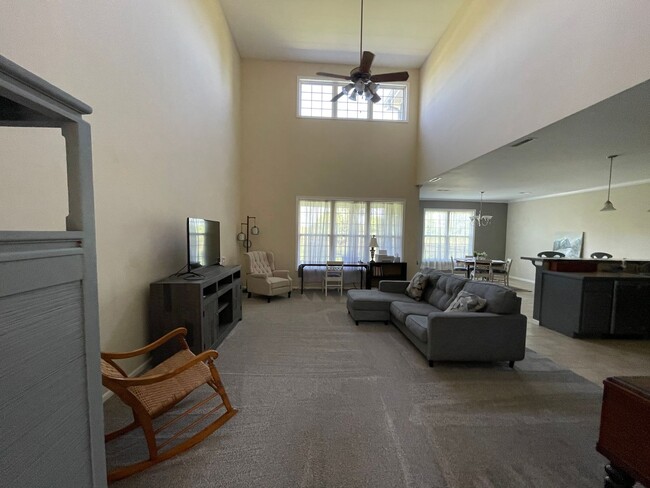 Building Photo - CLOSE TO FORT RILEY, FENCED BACKYARD!