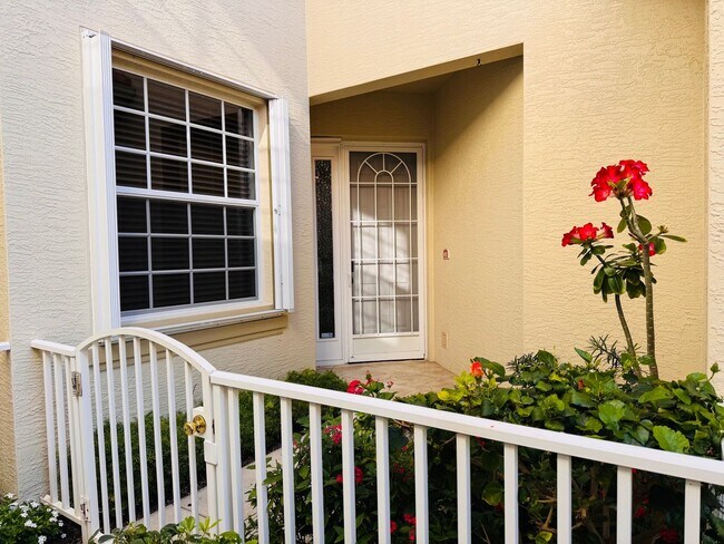 Building Photo - Experience Bell Tower Park. GATED ground floor 2 Bed 2 Bath Den 1 Car Garage Condo.