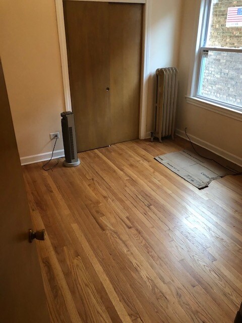 Building Photo - 1431 N Menard Ave