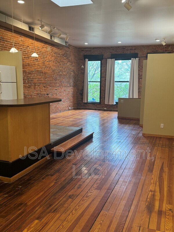 Building Photo - 220-224-224 E 4th St