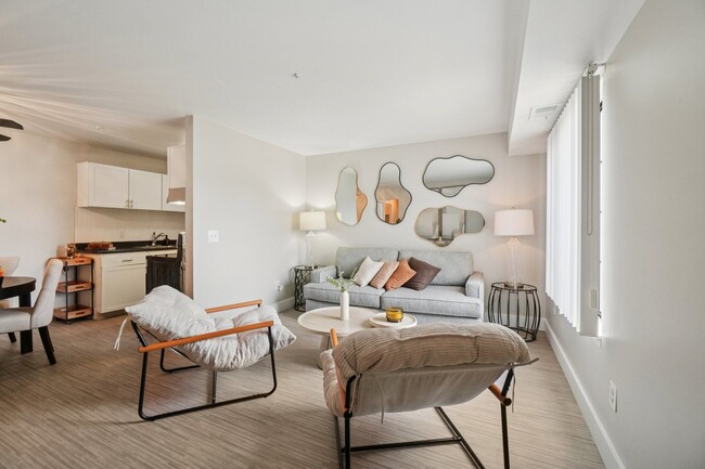 Spacious living areas provide room for comfortable seating and entertaining in Canton Township, professionally operated by Highlands Vista Group. - Bainbridge Park