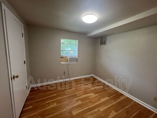 Building Photo - 7064 Mitchell Ave
