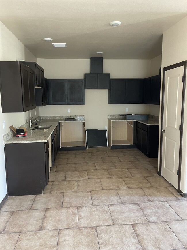 kitchen area with all appliances included (dishwasher, fridge, microwave) - 813 Ts Daniel Cadena Dr