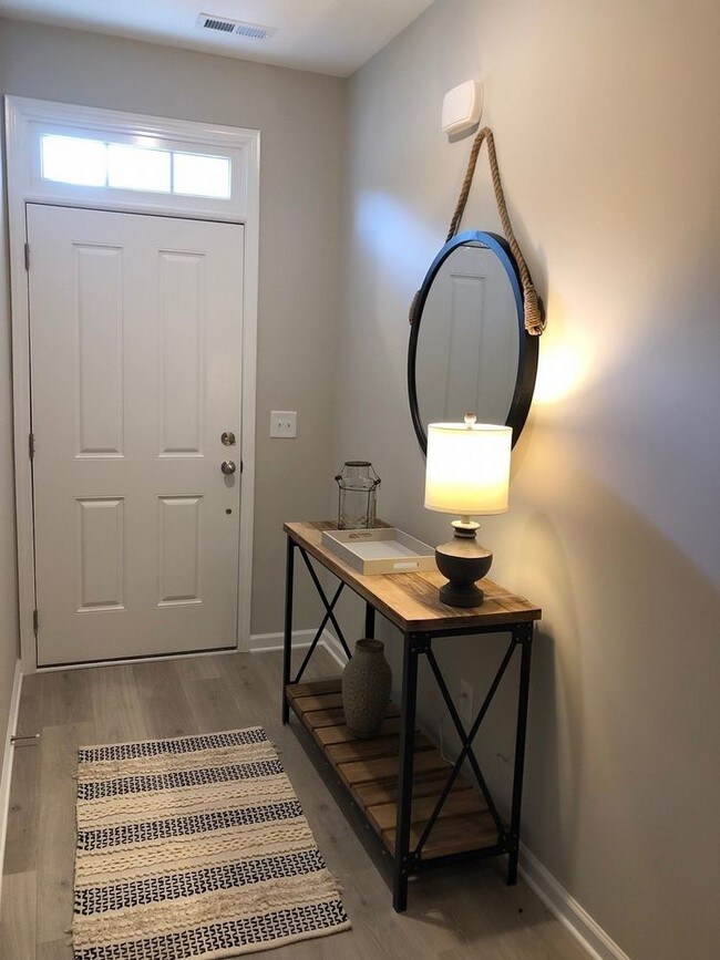 Building Photo - Brand New FURNISHED End Unit Townhome