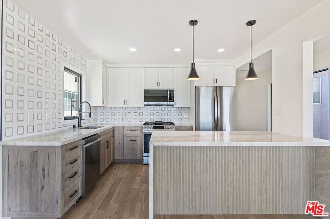 Foto del edificio - 6405 Ocean Front Walk