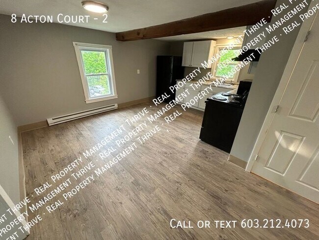 Building Photo - Updated 2nd Floor 2 BR, 1 BA...First Month...