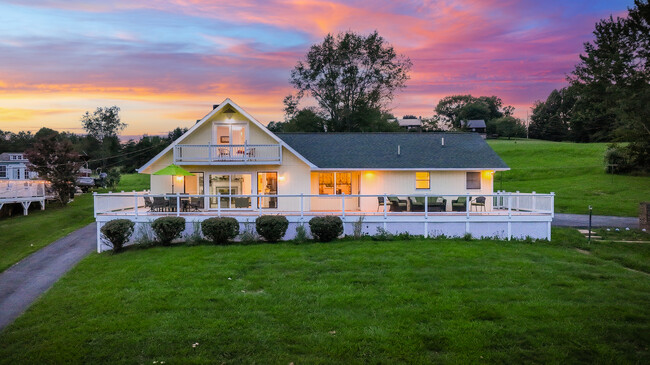 Back of the house with main deck - 21392 Lakeshore Dr