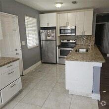 Building Photo - 16115 NW 42nd Ave