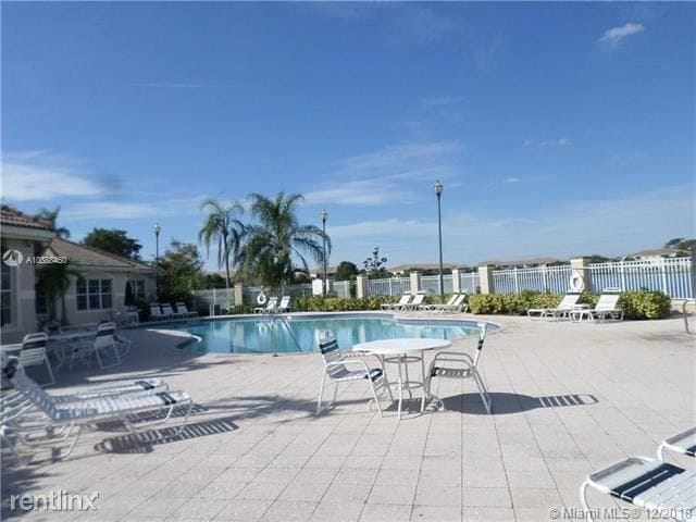 Building Photo - 3 br, 2 bath House - 5065 Wiles Rd Apt 104