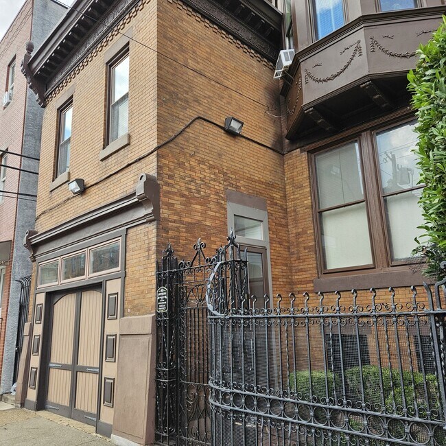 entranced with lock on Iron Gate - 2342 S Broad St Apartments