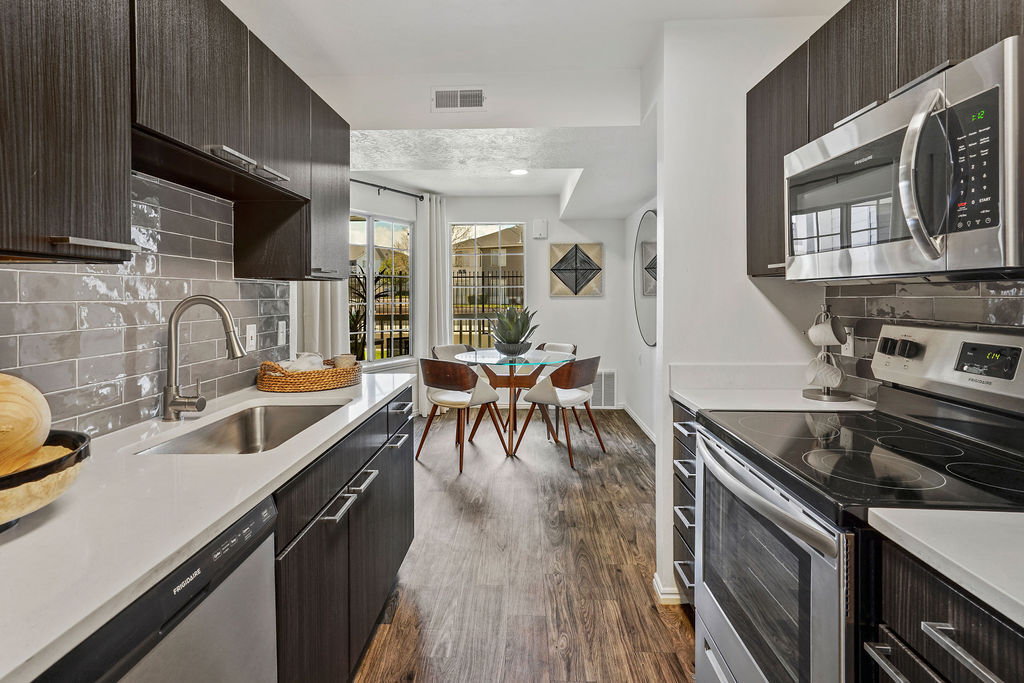 Renovated Kitchen and Dining Area - Woodgate at Jordan Landing