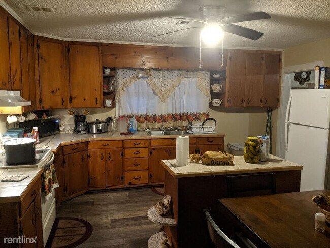 Foto del edificio - 3 br, 1 bath House - 614 1/2 E 12th Ave