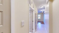 Located at 445 Zion St in Hartford, CT, this one-bedroom, one-bathroom unit offers a thoughtfully arranged single-floor layout that maximizes every square foot. The combined kitchen and living area serves as the heart of the home, where warm hardwood flooring transitions seamlessly to tile beneath the kitchen. Rich cherry wood cabinetry pairs with granite countertops, a white electric range, and a full-size refrigerator to create a functional and attractive cooking space. Natural light fills the open living area, enhancing the warm, neutral color palette throughout.

The bedroom is a comfortable, well-proportioned retreat featuring gleaming hardwood floors and two windows that invite an abundance of natural light and outdoor views of the surrounding greenery. A set of double doors opens to a dedicated closet, and the unit benefits from three closets in total, offering generous storage throughout.

The bathroom is finished with tile flooring, a rich wood vanity topped with granite, and a full-size mirror, creating a clean and practical space. A hallway connects the main living areas efficiently, and the overall layout feels organized and easy to navigate. Ceiling-mounted light fixtures, fresh neutral walls, and consistent finishes contribute to a cohesive, move-in-ready ambiance throughout this well-maintained Hartford residence.