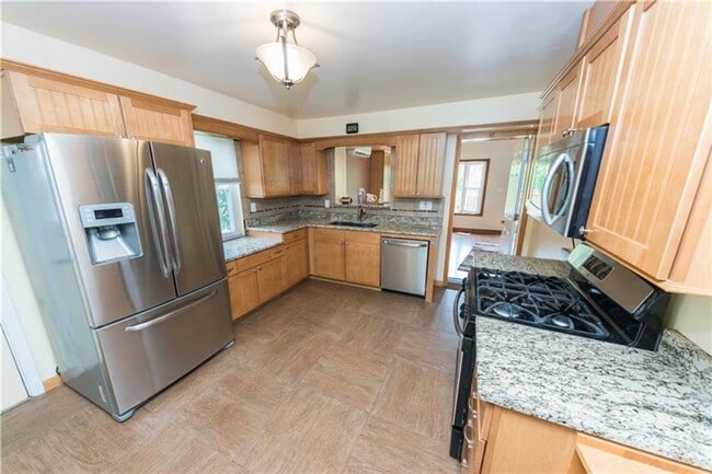 Building Photo - Spacious 4-Bedroom Rental with Huge Deck &...