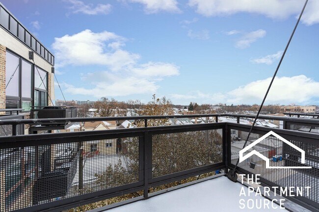 Foto del edificio - 4133 W Belmont Ave