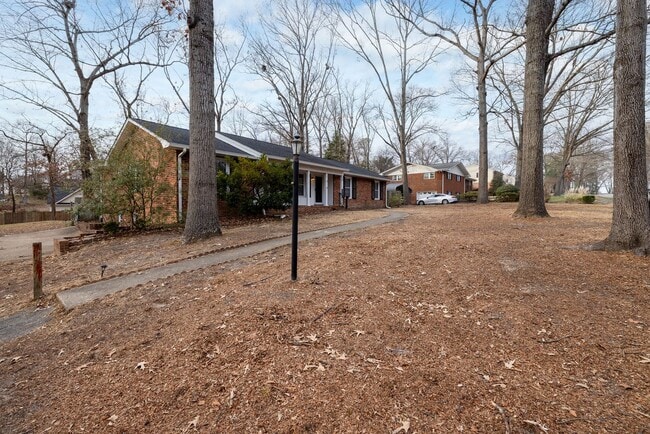 Building Photo - Exquisite 5-Bedroom Retreat: Luxury Living...