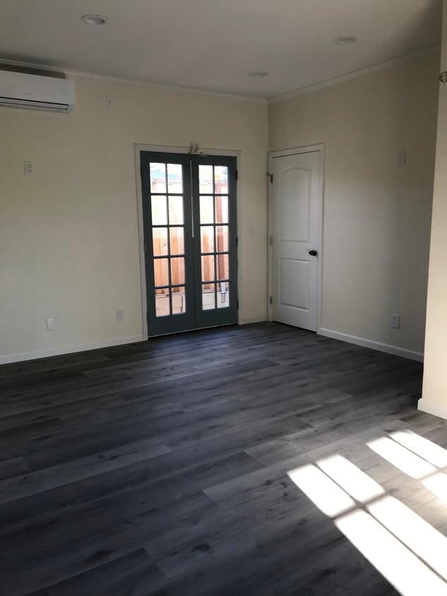 Living room, door to backyard - 3120 Mauricia Ave