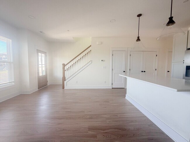 Building Photo - 3-Bedroom Highbury Townhome with Flex Room | Modern Living + Resort-Style Amenities