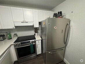 Building Photo - 4235 N University Dr