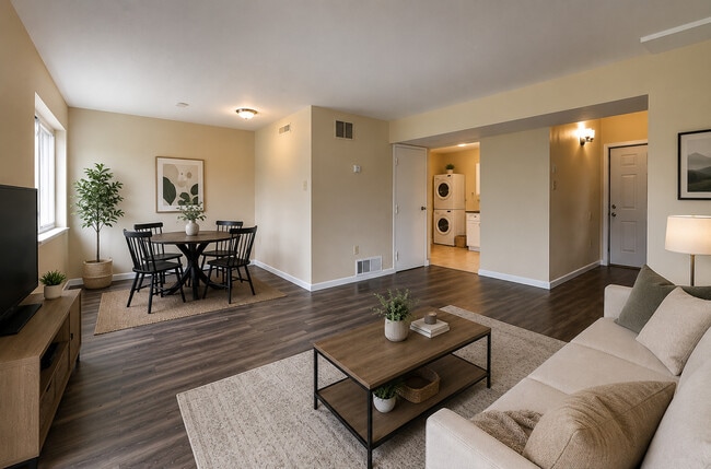 Townhouse Living Room/Dining Room/kitchen with laundry hookup - Emunah Manor Apartments