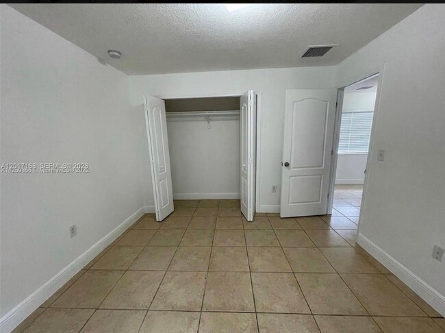 Building Photo - 5881 NW 32nd Ave