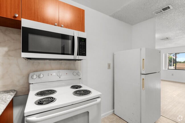 3BR, 2BA - 963SF - Kitchen - Oasis Villas