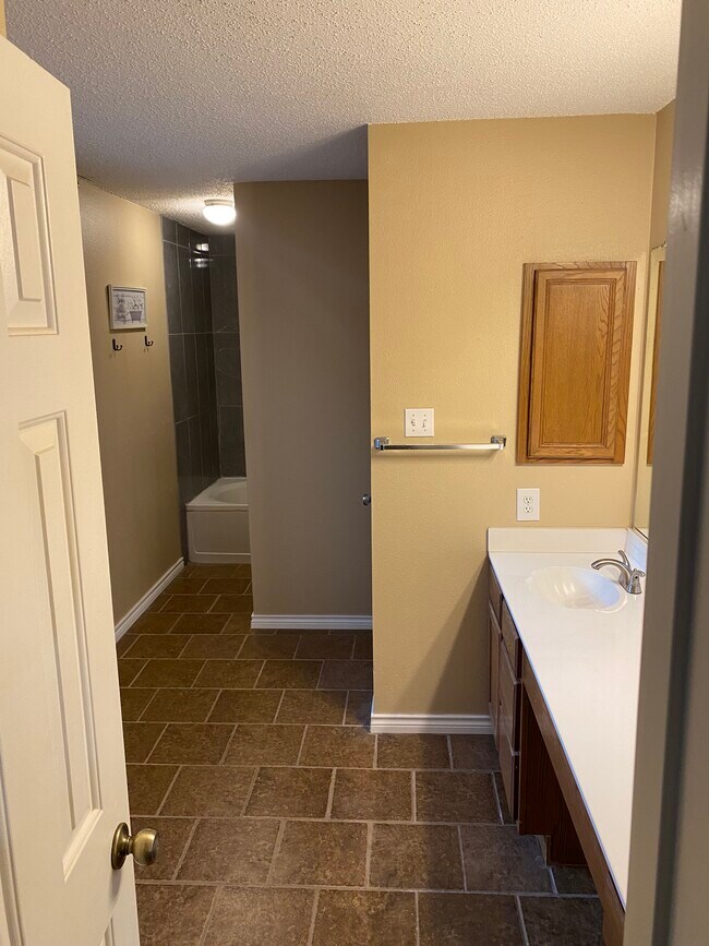 Building Photo - 18014 Redriver Song