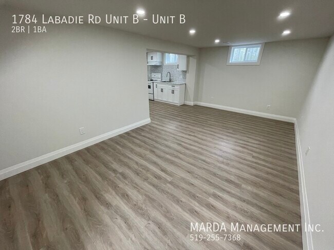 Building Photo - SPACIOUS & BRIGHT 2 BED/1 BATH LOWER UNIT + 40% UTILITIES