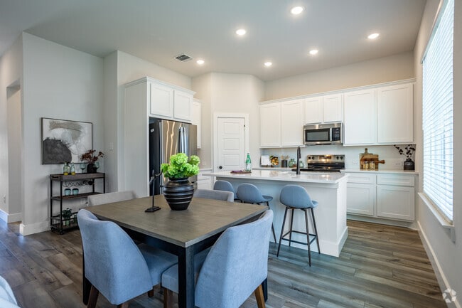 2BR, 2B - 1,114SF - Kitchen/Dining Area - Canopy Homes at Woodcreek