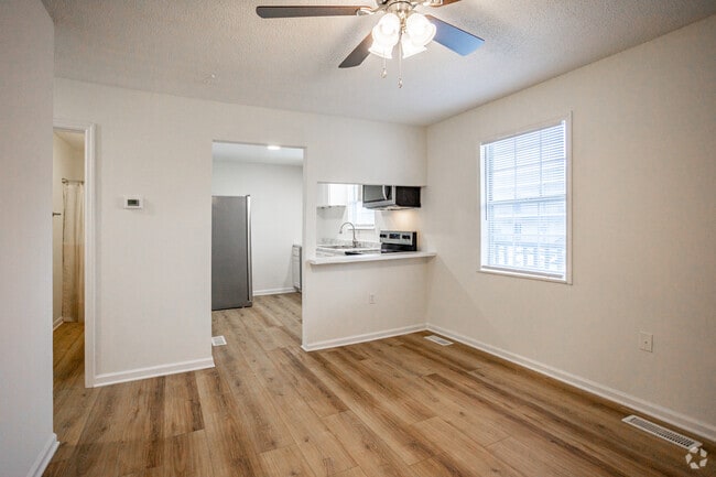 2BR, 1BA - 900SF - Living Room - New Adventure Apartments