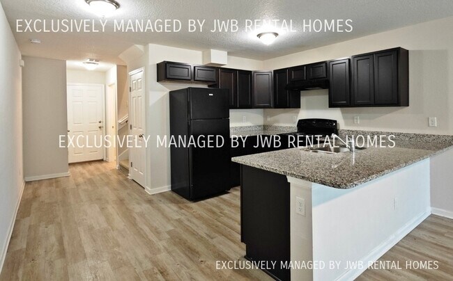 Building Photo - 8472 McGirts Village Ln