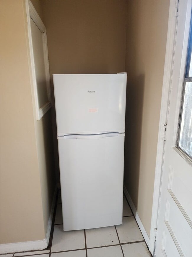 Building Photo - Move In Special: $150 off first full month.