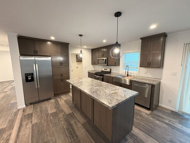 Foto del edificio - 5045 W Sawgrass Dr
