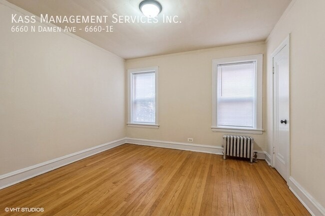 Building Photo - 6660 N Damen Ave