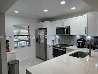 Building Photo - 8360 Boca Glades Blvd E