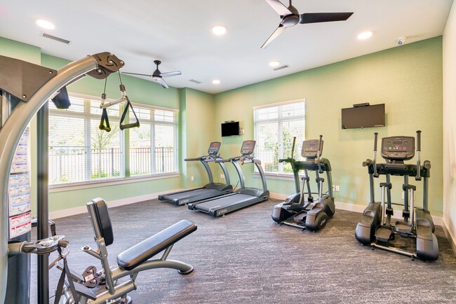 Fitness center onsite - Evoke Living at Sugar Creek Apartments