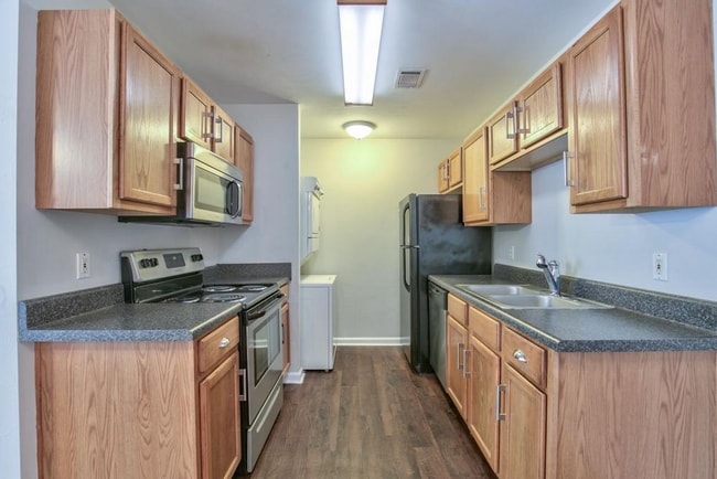 typical kitchen - 990 W Brevard St Apartments