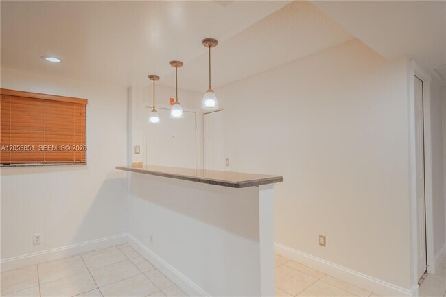 Building Photo - 2700 Coral Springs Dr