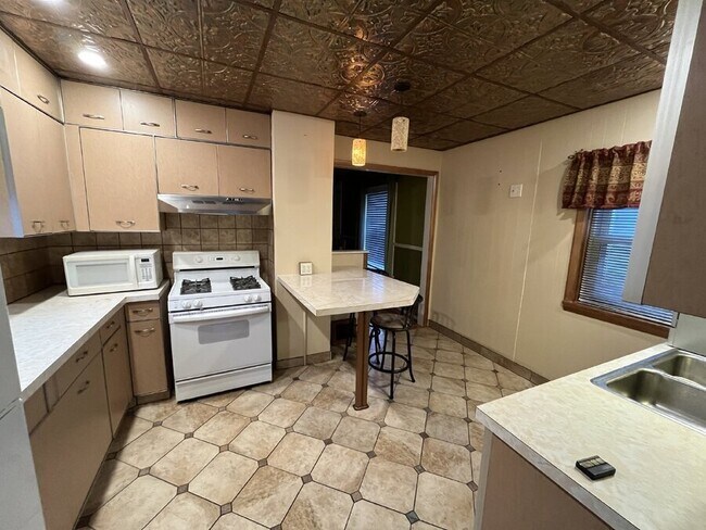 Foto del edificio - 4909 E 71st St