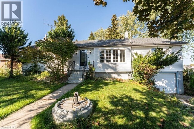 Photo du bâtiment - 9724 Twenty Rd W