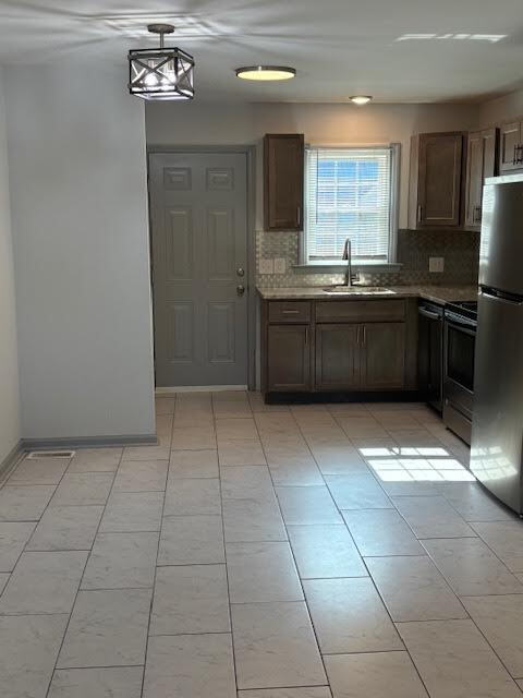 Building Photo - "Cozy 2-Bedroom Retreat with Granite Elega...