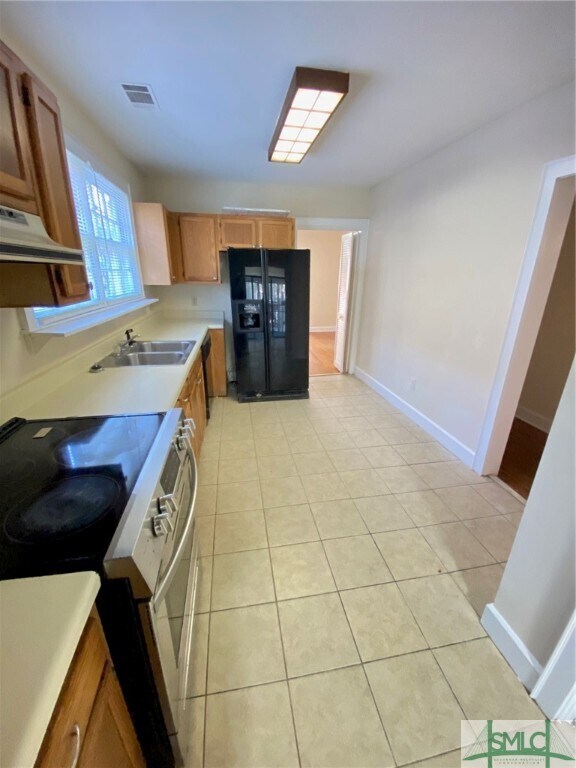 Foto del edificio - 718 W 44th St