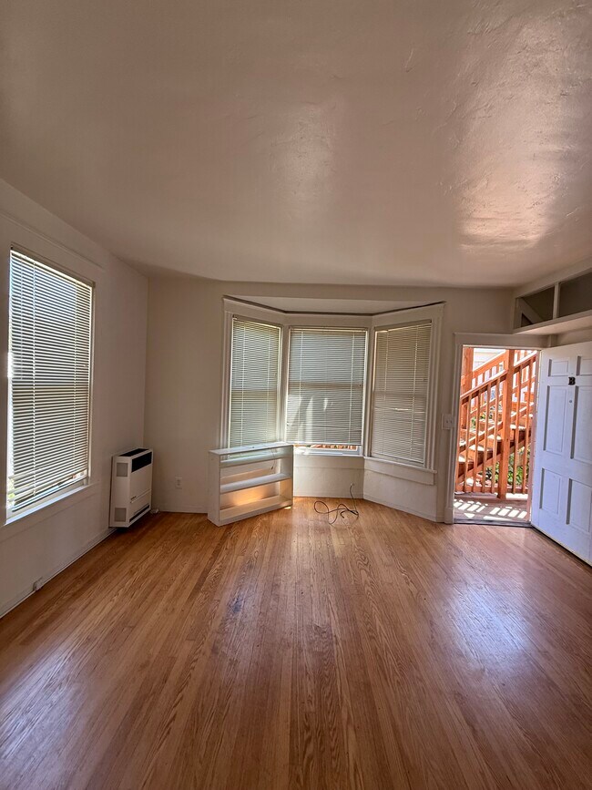 Living Room - 2801 Fulton St Apartments