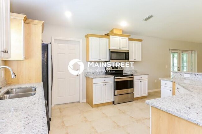 Building Photo - 3 Bedroom Pet-Friendly Home in NORTH PORT, FL with Main Street Renewal
