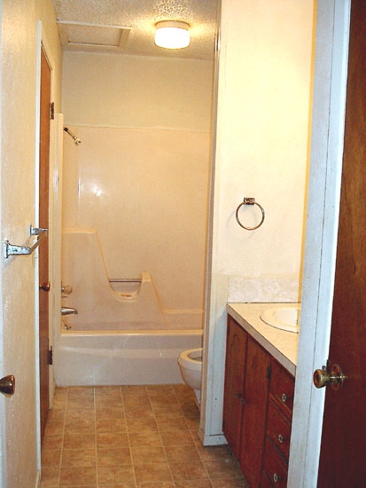 Baño - Lone Star Apartments