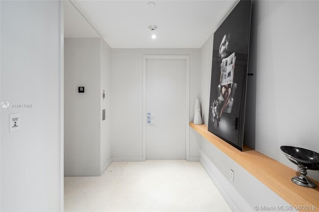 Building Photo - 10203 Collins Ave