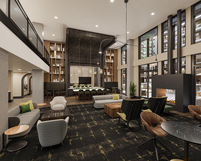 Expansive clubroom with gathering space, bar area, fireplace, and lounge seating at Modera H Street in Washington, D.C. - Modera H Street