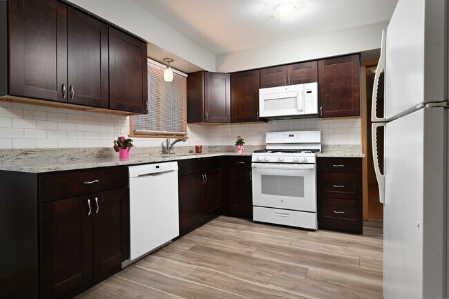 Foto del edificio - 5850 N Mulligan Ave