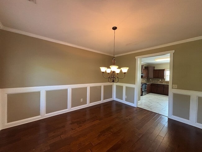 Building Photo - This property blends ample living space and storage with functional amenities.