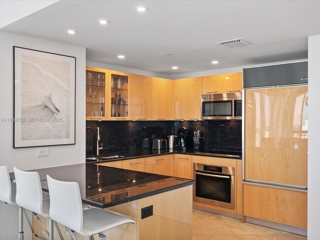 Building Photo - 6899 Collins Ave